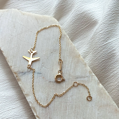 travel lovers gift globetrotters Gift for Her travel gift 14K Gold Airplane Bracelet for Women made by Negru Jewelry online store from solid 14k gold on bracelet chain aviation gift cabin crew flight attendant