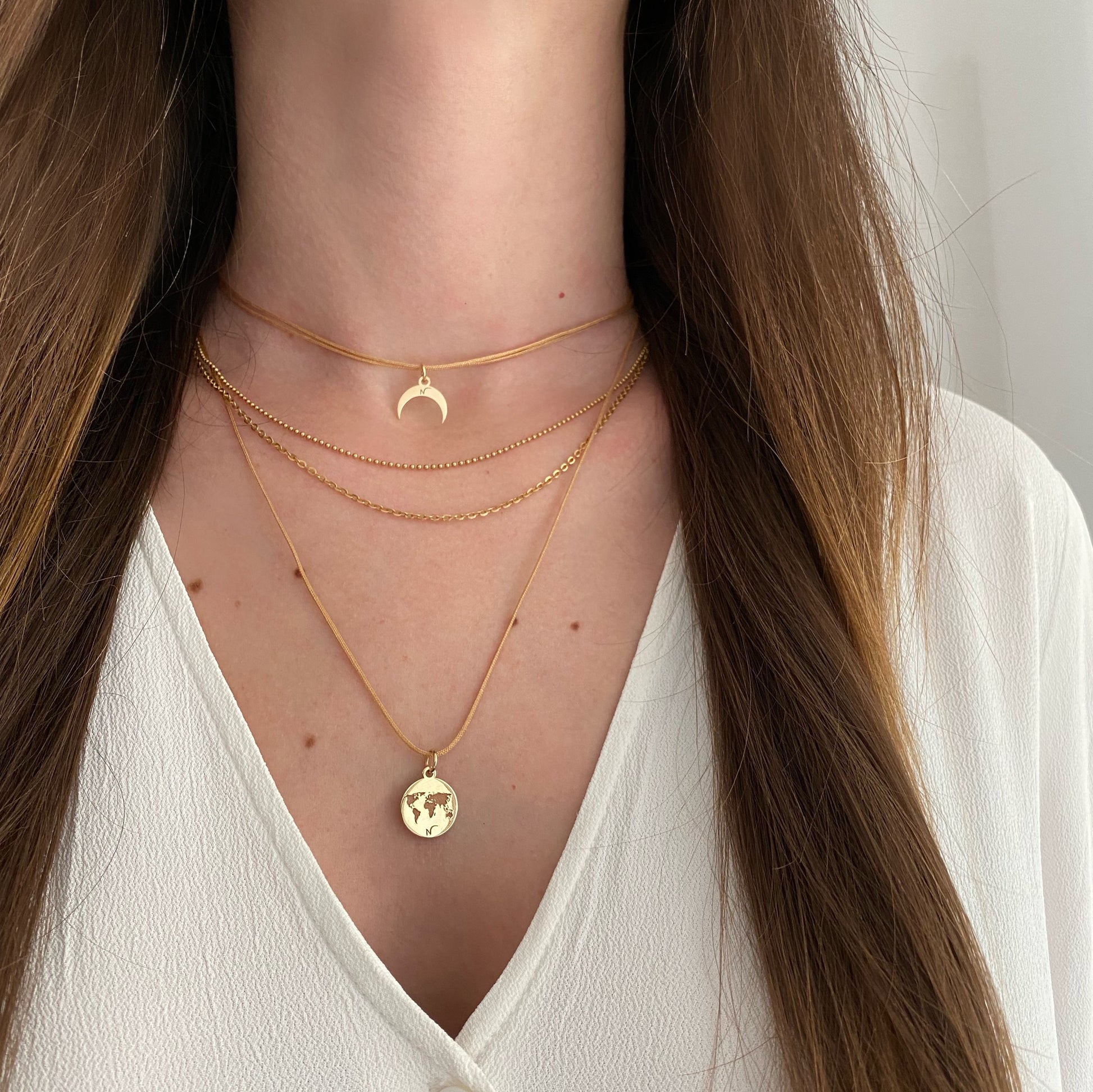 World Map and Crescent Moon pendants 14k solid gold by Negru Jewelry