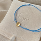 14K Gold Heart Charm Bracelet for Women with blue cord made by Negru Jewelry store