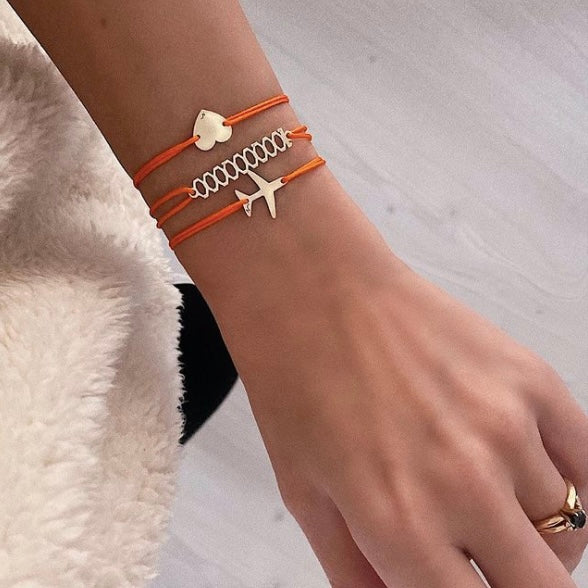 14K Gold Billionaire Charm Bracelet for Women orange cord by Negru Jewelry shop